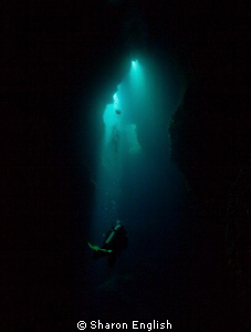 'Into the light' on a dive site named Cathedral in Port V... by Sharon English 